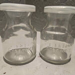 Crate & Barrel Creamery Clear Glass Carafe Jar Lids 2oz 3-1/4" Set of 2